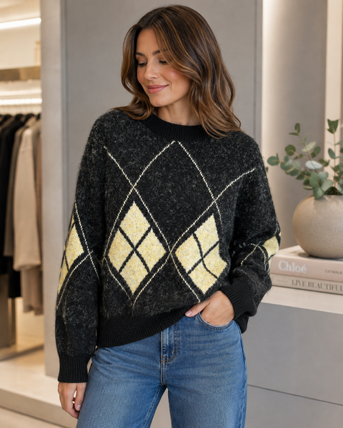 SWEATER NEGRO JASPEADO CON ROMBOS AMARILLO